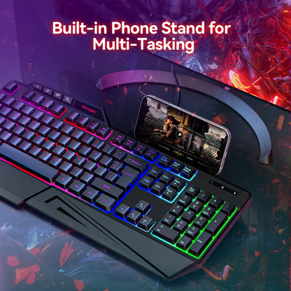 TECKNET Kabelgebundene RGB-Gaming-Tastatur – 26-Tasten-Anti-Ghosting, 13 Beleuchtungsmodi, spritzwassergeschützt, 108 Membrantasten, Plug &amp; Play – mit ergonomischer Handballenauflage und Telefonhalterung für Windows/Mac (Schwarz)