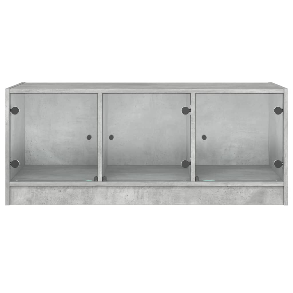 vidaXL Couchtisch mit Glastüren Betongrau 102x50x42 cm
