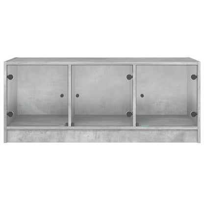 vidaXL Couchtisch mit Glastüren Betongrau 102x50x42 cm