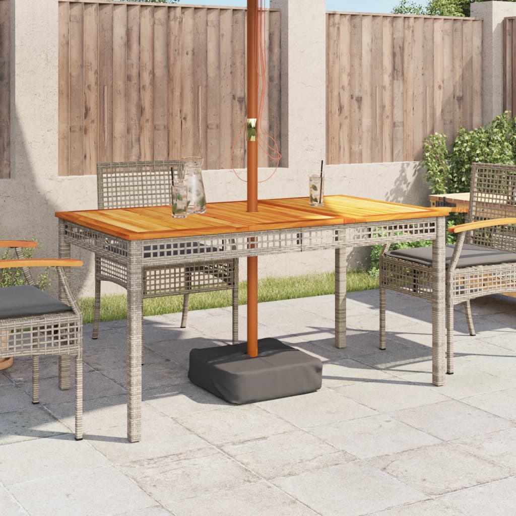 vidaXL Table de jardin Gris 140x80x75 cm Résine tressée Bois d'acacia