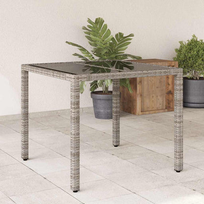 vidaXL Table de jardin avec plateau en verre gris 90x90x75 cm résine tressée