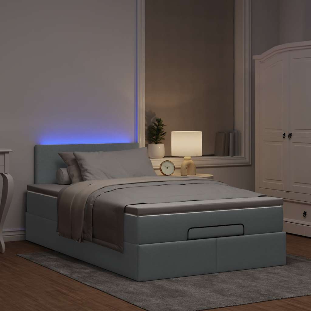 Ottoman-Bett mit Matratze & LEDs Hellgrau 120x200 cm Stoff