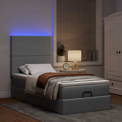 Ottoman-Bett mit Matratze & LEDs Hellgrau 100x200 cm Stoff