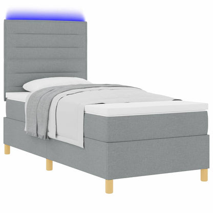 LED Boxspringbett mit Matratze Hellgrau 90 x 190 cm Stoff